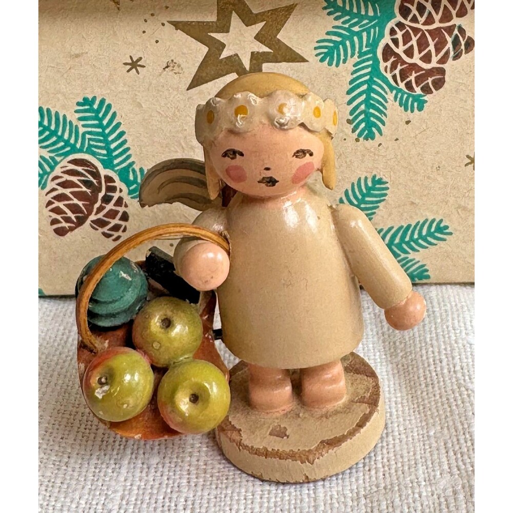 Vintage Wendt Kuhn Marguerite Angel holding apple basket, Erzgebirge Germany
